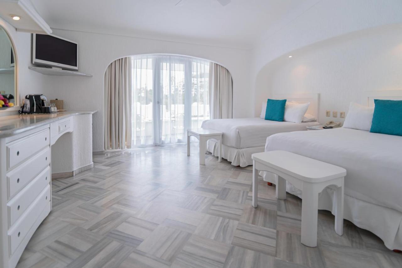 라스 아다스 바이 브리사스 만사니요 외부 사진 A room at the Boca Raton Resort